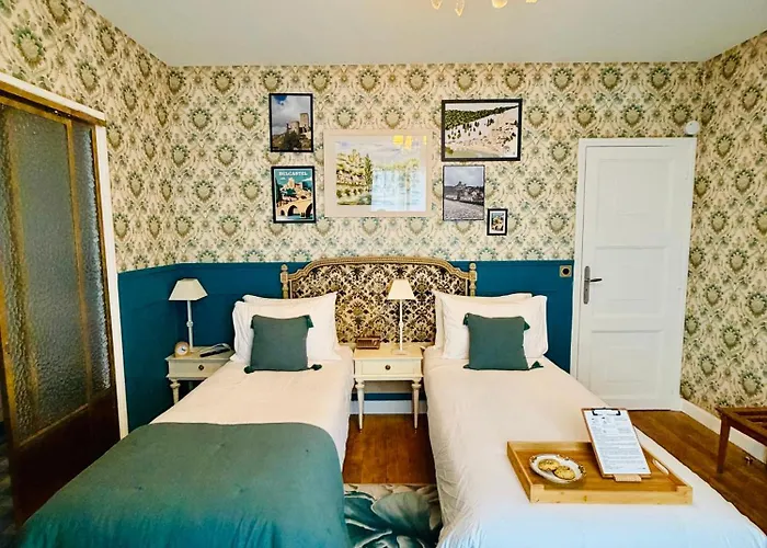 ゲストハウス La Maison Au Toit 4*